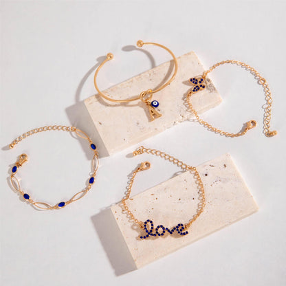 4 Bracelet Papillon-Amour-Fleur Bleu La Boutique du Bonheur